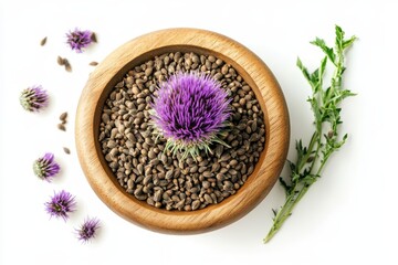 A purple milk thistle flower sits atop a pile of its seeds in a wooden bowl, isolated on white background