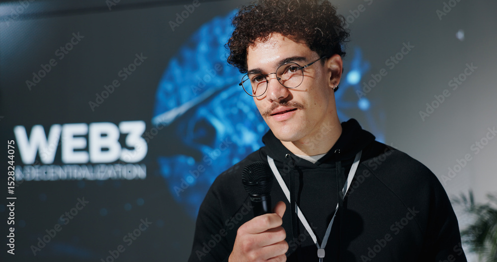 Poster Business, seminar and speech with man in auditorium for presentation on web3 development. Mic, event and stage with speaker for intro to blockchain technology or decentralization of user experience
