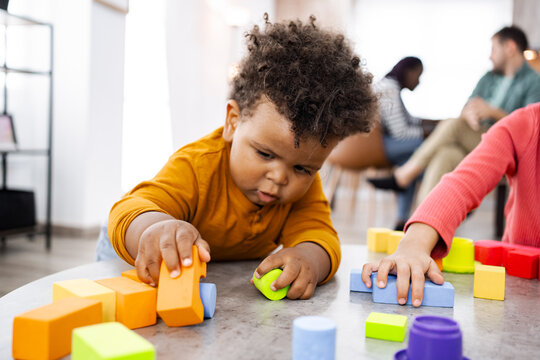 Joyful afternoon of play with family in cozy home space