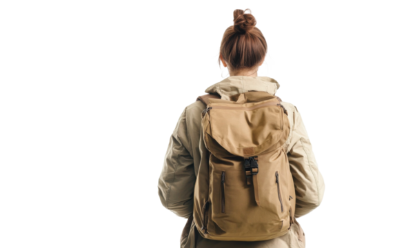 Woman wearing a tan jacket and a brown backpack