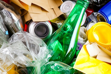 Mixed recyclable waste of plastic, metal, paper and glass