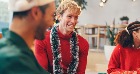 Man, laughing and friends at house for Christmas event, holiday celebration and social gathering....