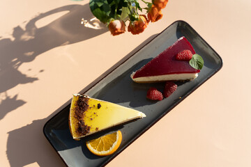 Piece of cake on a plate outdoor on a sunny day