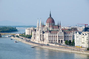Fototapeta premium ungarian Parliament Building and Danube River in Summer – Iconic Landmark in Budapest