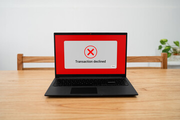 Transaction declined screen on laptop screen. Concept of failing to make a payment through online...