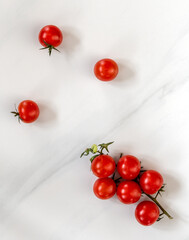 cherry tomatoes on a branch