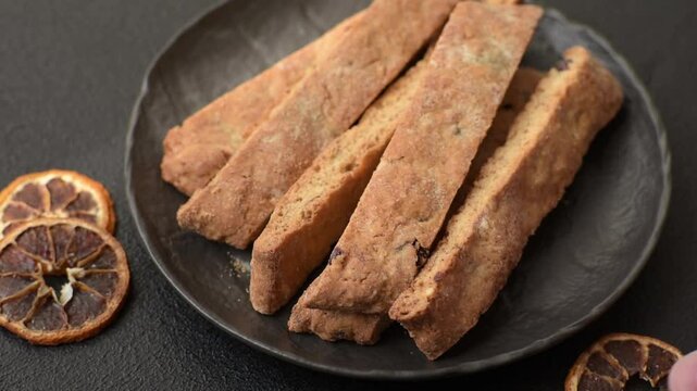 Biscotti or cantuccini biscuits, a crispy sweet Italian pastry. Biscotti dessert with almond and cranberry