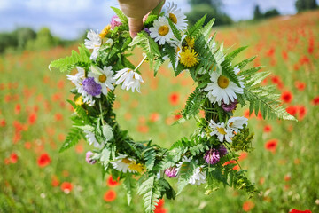 Summer Solstice Day, Midsummer, Litha holiday. Flowers wreath