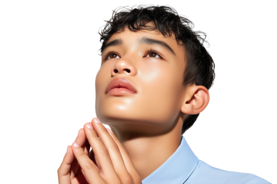 close-up of a teen boy from Southeast Asia looking upward with calm optimism, hands loosely clasped at chest, transparent background