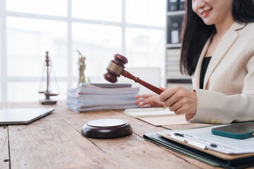 Smiling Lawyer with Gavel in Office