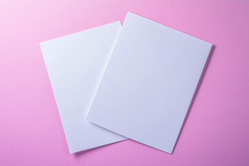 Creative arrangement of two blank A4 sheets on a vibrant background