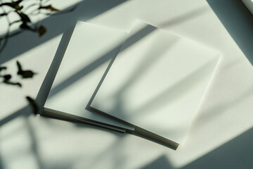 Overlapping sheets reflecting tranquility on a smooth surface