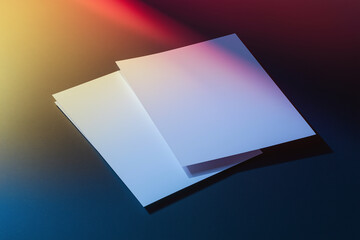 Elegant blank sheets poised for creativity in soft light