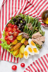 Nicoise salad with vegetables, tuna, eggs and anchovies .style hugge