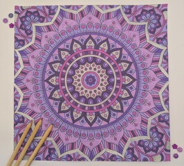 Purple hand painted mandala and pencils