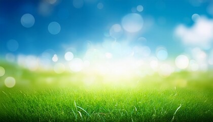 Obraz premium abstract nature blur background with bokeh light sunny spring meadow blur background blue sky to green grass gradient