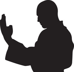 Silhouette of a Man in a Robe Practicing Martial Arts