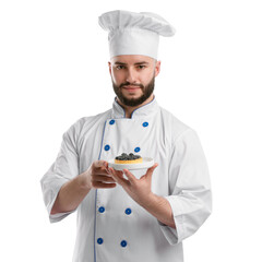 Happy confectioner in uniform holding delicious tart with blueberries on white background