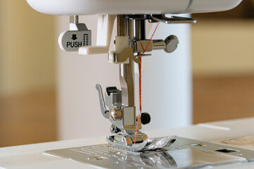 Close-up of sewing machine presser foot assembly