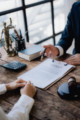 Attorney Reviewing Contract with Client