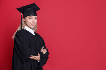 Happy student after graduation on red background. Space for text