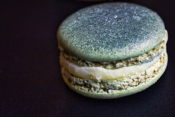 Close up photography of isolated macaron: beautiful texture and details. Food porn picture. Yummy view!