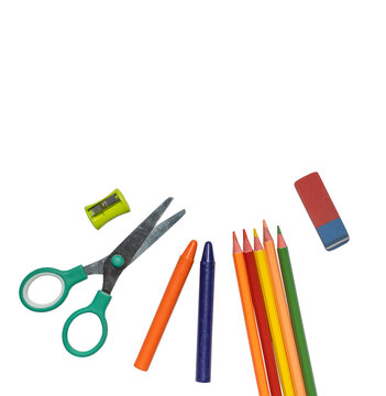 Top view of assorted stationery items including scissors crayons colored pencils and eraser isolated on transparent background. 
