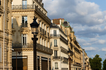 Paris, typical facades and windows, beautiful buildings, with old zinc roofs
