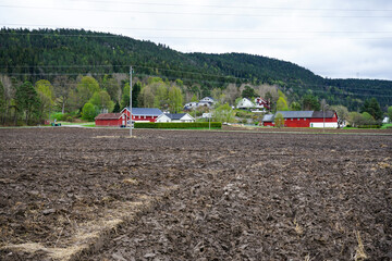 Black soil plowed fiel, earth texture. Rustic background.