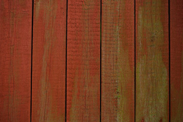 Red painted wooden wall wexture background.