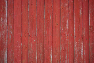 Red painted wooden wall wexture background.