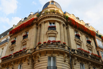 Paris, typical facades and windows, beautiful buildings, with old zinc roofs