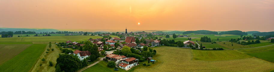 Aerial view: Bavarian village at sunset