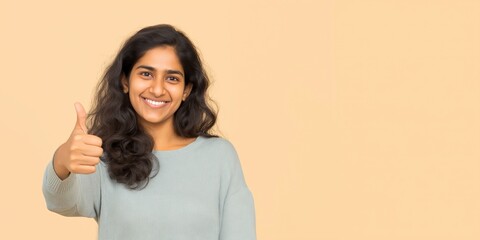 Indian Woman Expressing Agreement and Encouragement with Copy Space for Text 