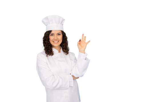 Female chef grinning, showing okay gesture, white background