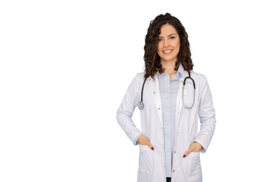 Confident female doctor smiling with hands in pockets, wearing lab coat and stethoscope on a transparent background