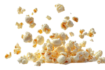 Fluffy popcorn kernels flying in the air with a light background, perfect for snacking and movie nights.