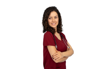 Professional female physician in maroon scrubs, stethoscope draped, confidently posing with crossed arms, gazing aside on isolated background