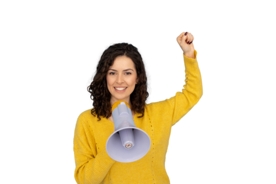 Curly-haired woman in yellow sweater holding megaphone, raising fist, expressing empowerment against transparent backdrop - Powered by Adobe