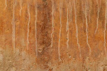 Detail of weathered stucco wall.