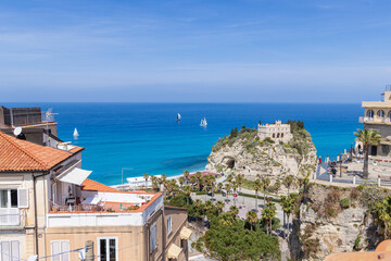 Italy, Calabria, Tropea. Residential buildings and Santa Maria dell’Isola Church on a bluff...