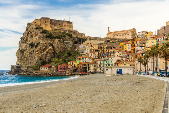 Italy, Calabria, Scilla. Scilla Beach looking east to the old town and Castello Ruffo di Scilla (Ruffo Castle).