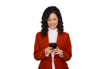 Smiling professional with curly hair wearing red blazer, checking smartphone against transparent backdrop