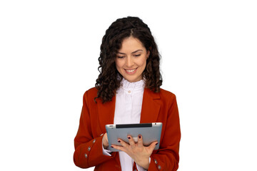 Smiling professional with curly hair wearing red blazer, working on digital tablet against...