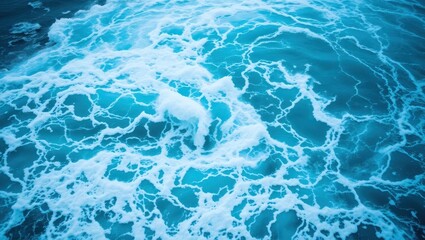 Aerial View of Turquoise Ocean Water with White Foamy Waves