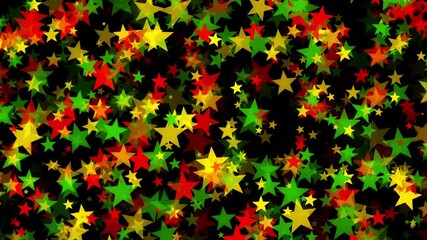 Stars floating outward in bold red, yellow, and green colors on black background for Juneteenth, or Freedom Day, to commemorate the ending of slavery on June 19th 1865 in the United States of America.