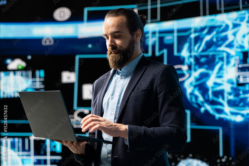 Poster entrepreneur uses laptop to review artificial intelligence brain system on dashboards, using high te