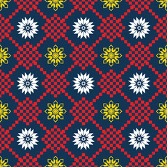 Colorful seamless pixel art pattern featuring geometric snowflakes and star shapes in red, white, yellow, and navy blue. Ideal for fabric, textile design, wrapping paper