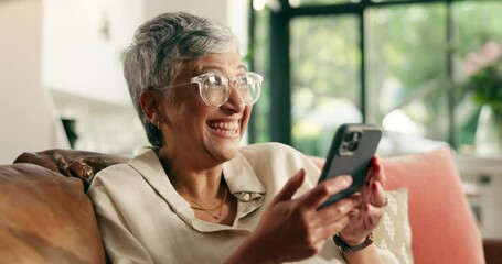 Home, excited and old woman on sofa, smartphone and winner with email notification. Apartment, pensioner and senior person on couch, cellphone and celebration with discount deal, competition or sales - Powered by Adobe