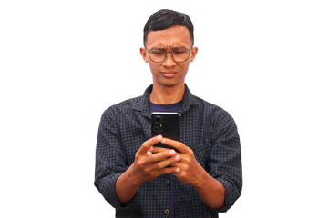 An Asian man holding a cellphone with a sad expression